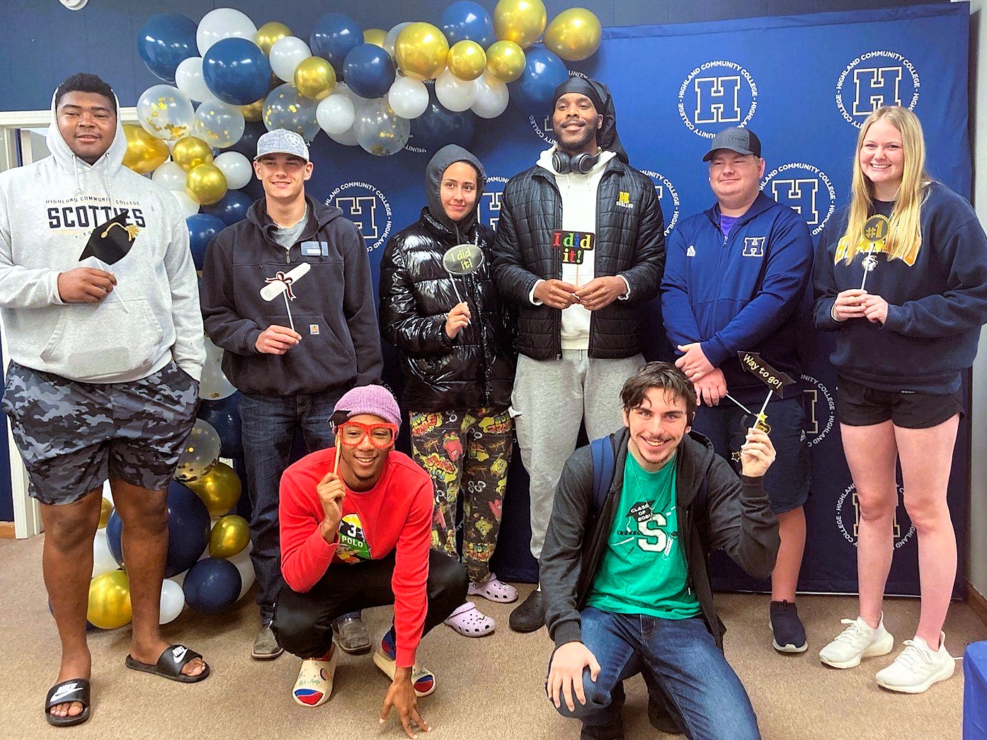 Group photo of SSS students celebrating graduation and end of the year.