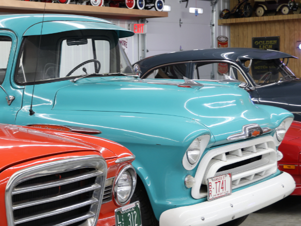 Row of classic, vintage cars from the Gilmore Memorial Hall Museum