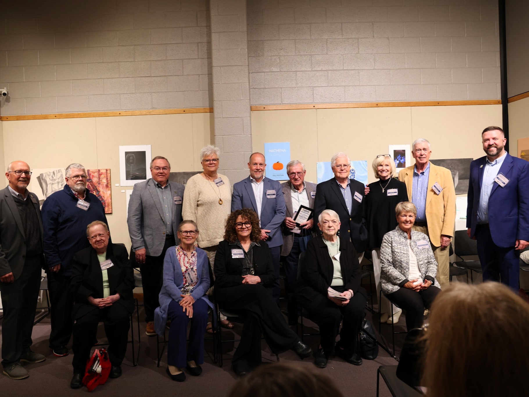 2025 Heritage Induction Group Photo with Keith Jaloma (Director) and President Bowhay on either side of the group.