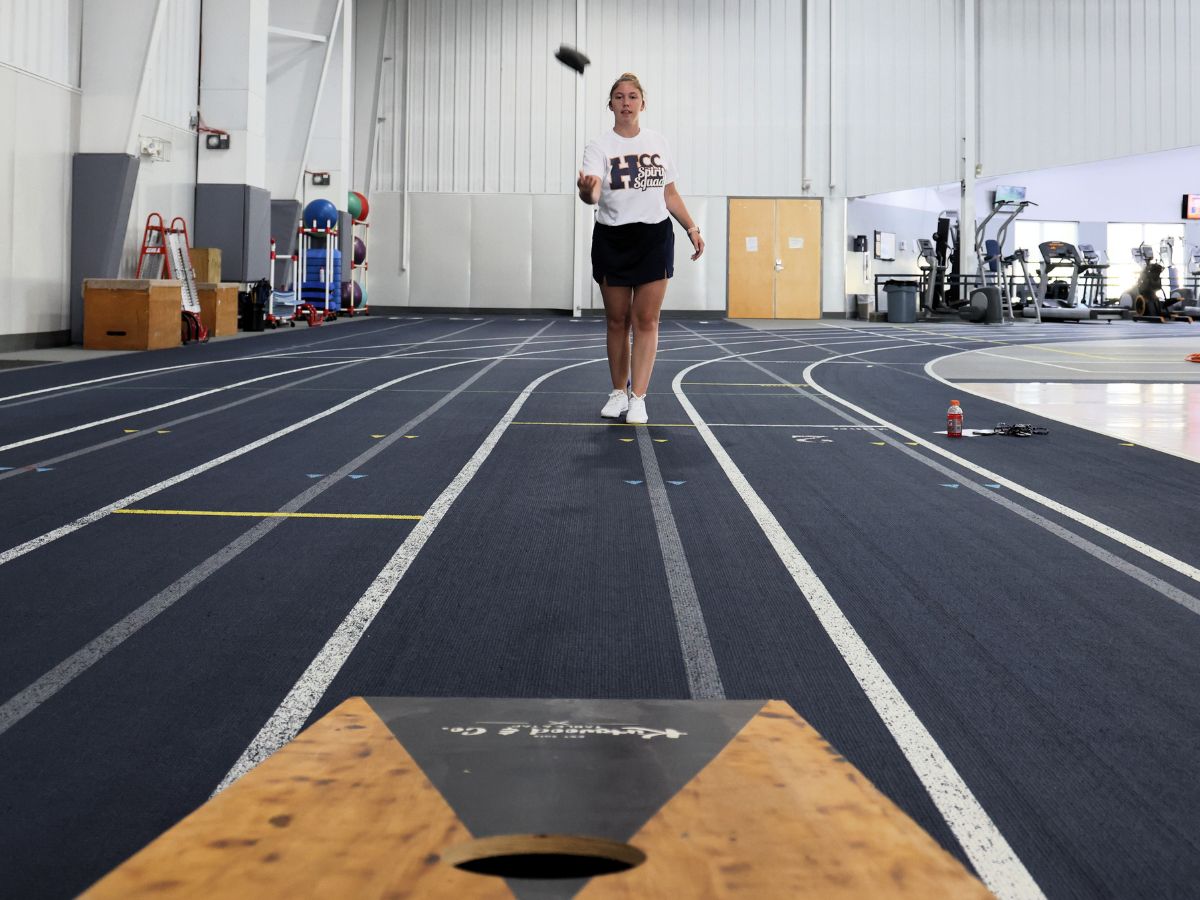 Student playing bean toss in the Wellness Center